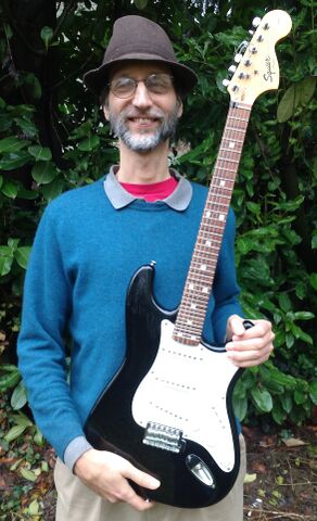 Pic of Kite Giedraitis with Kite Guitar Pic of Kite Giedraitis with Kite Guitar